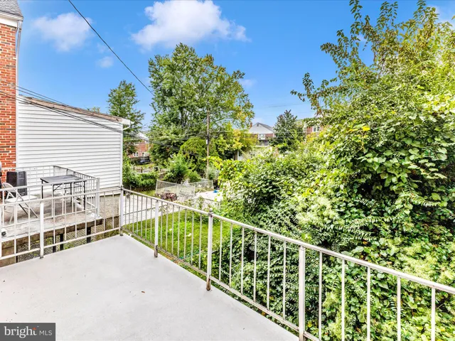 a view of a balcony with staircase