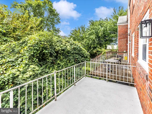 a view of a house with a large window