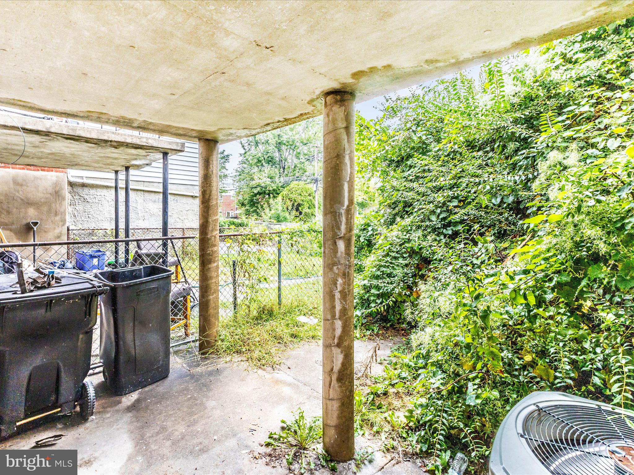 1331 Dalton Road Baltimore, MD 21234 - Photo 40 of 41 a living room with furniture and a floor to ceiling window