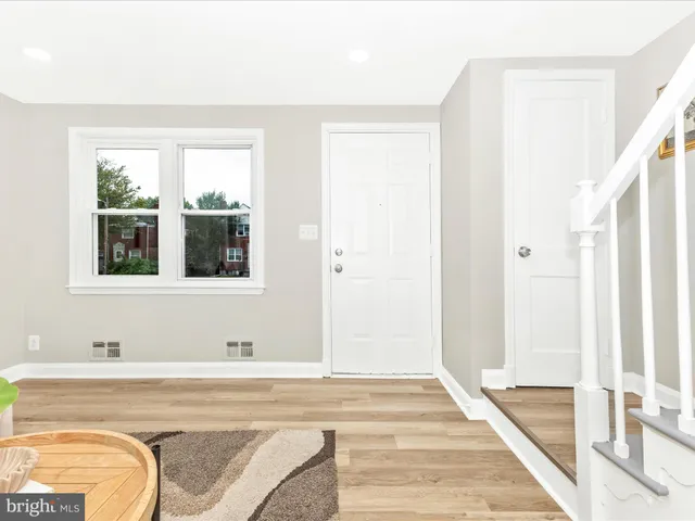 a bathroom with a tub and shower