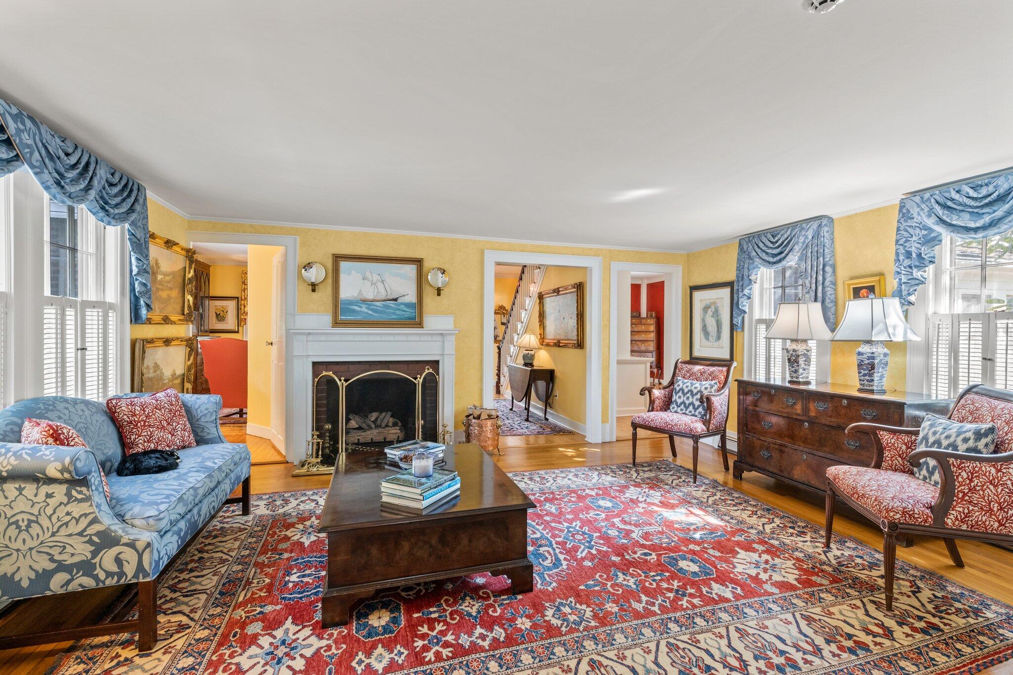 4259 Main Street Barnstable, MA 02630 - Photo 14 of 69 a living room with furniture fireplace and rug