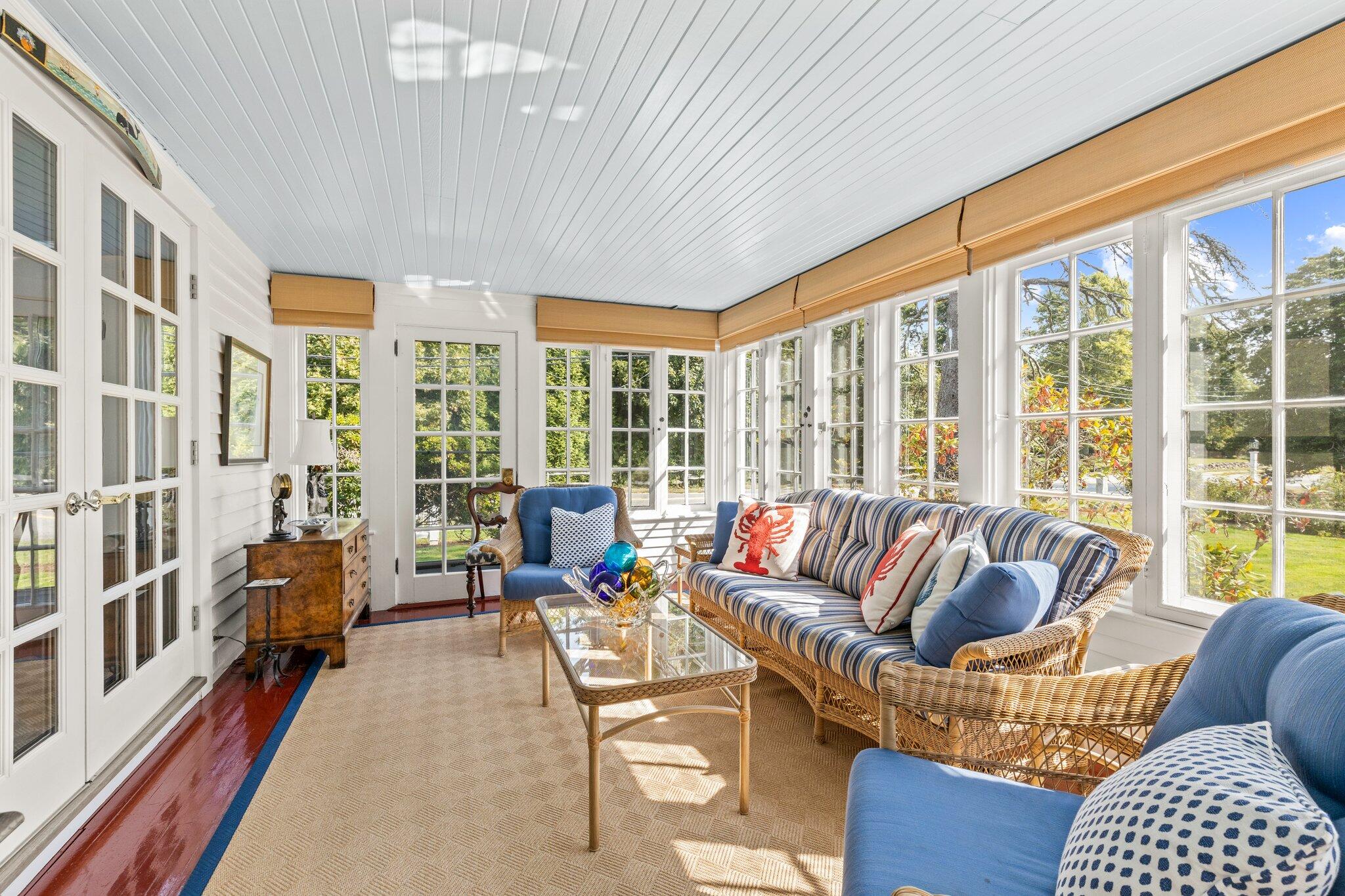 4259 Main Street Barnstable, MA 02630 - Photo 18 of 69 a living room with furniture and a large window