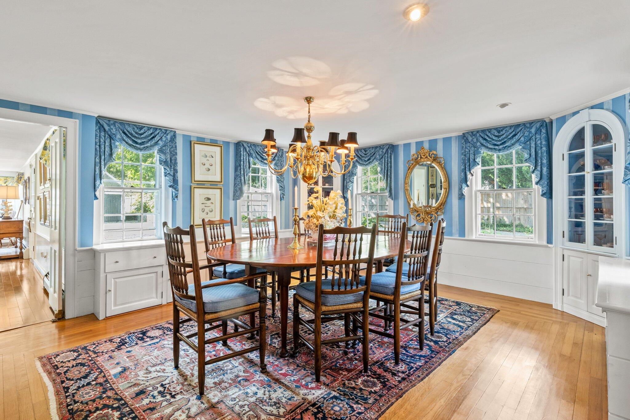 4259 Main Street Barnstable, MA 02630 - Photo 20 of 69 a view of a dining room with furniture window and wooden floor