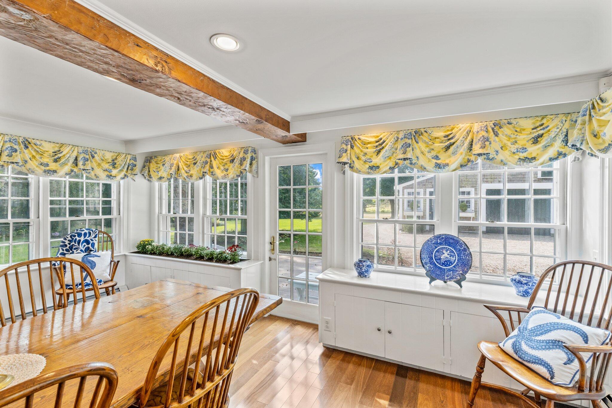 4259 Main Street Barnstable, MA 02630 - Photo 28 of 69 a living room with furniture and a large window