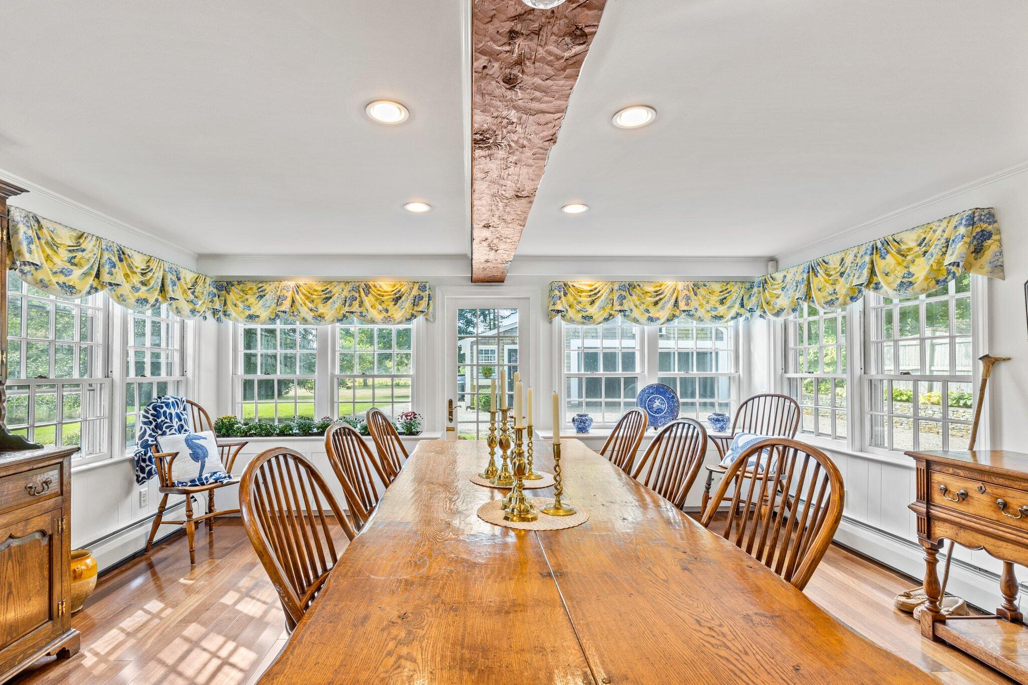 4259 Main Street Barnstable, MA 02630 - Photo 29 of 69 a balcony with furniture and large windows