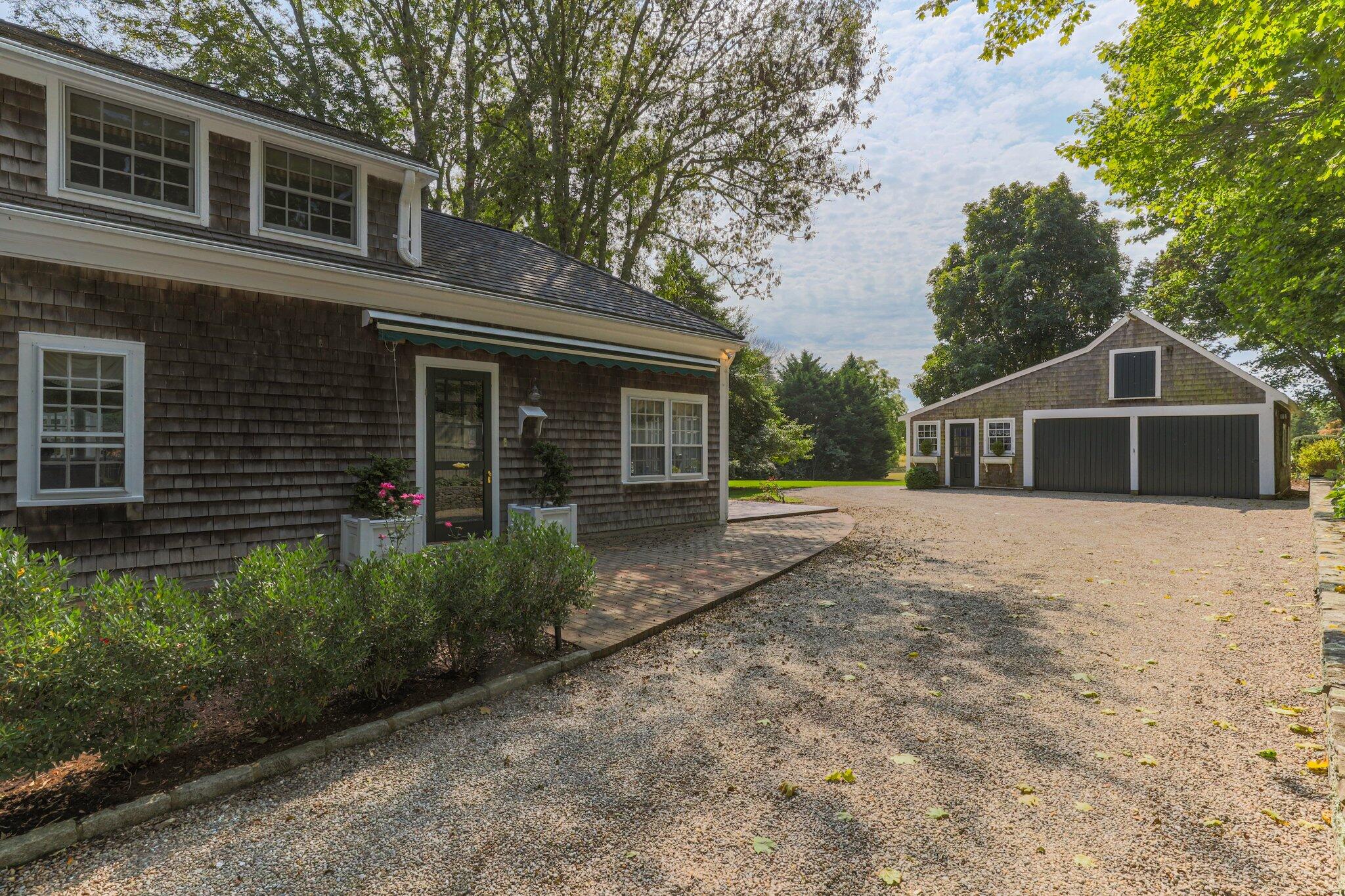 4259 Main Street Barnstable, MA 02630 - Photo 44 of 69 a front view of a house with garden