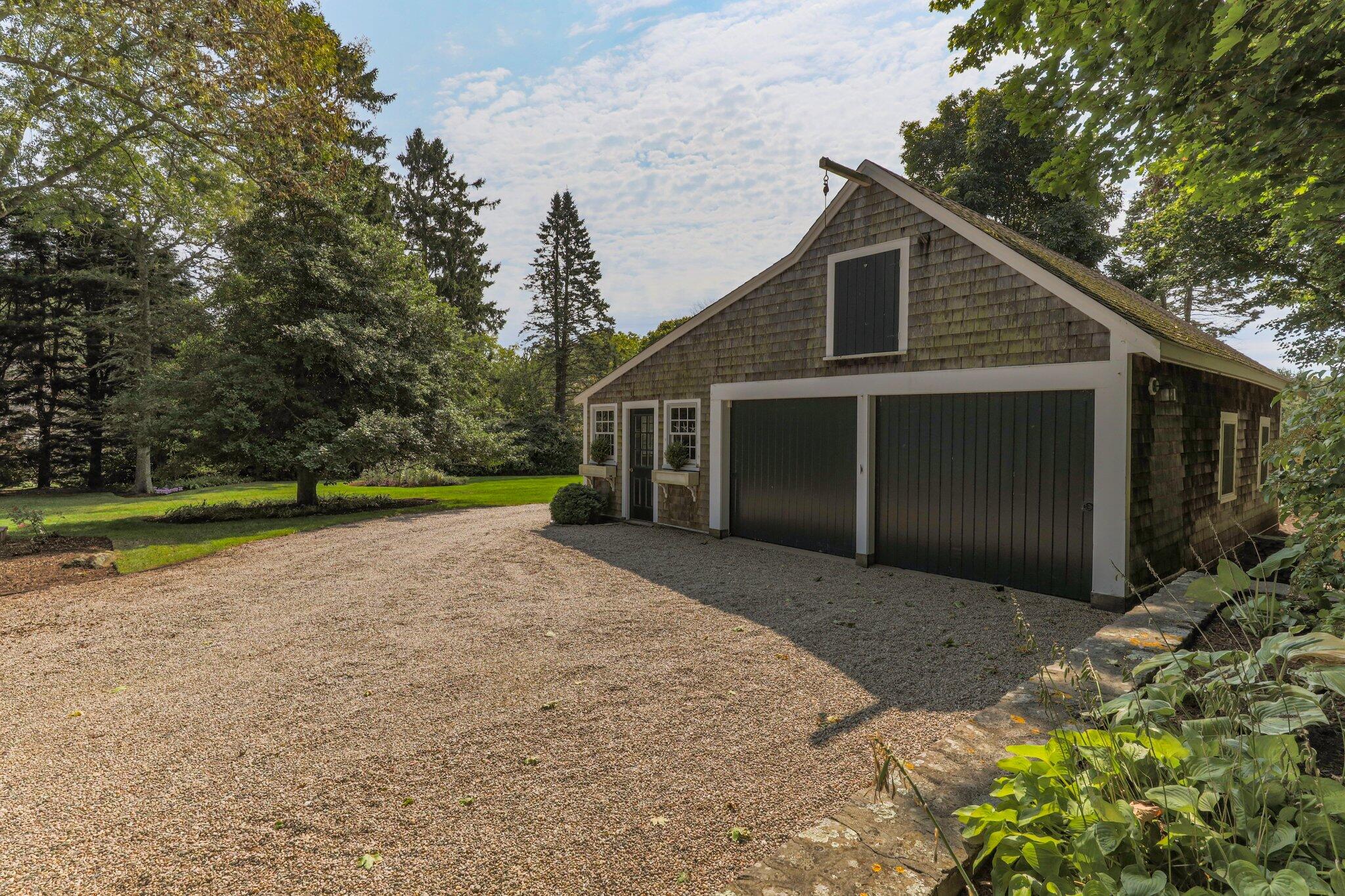 4259 Main Street Barnstable, MA 02630 - Photo 46 of 69 a view of a house with backyard and trees
