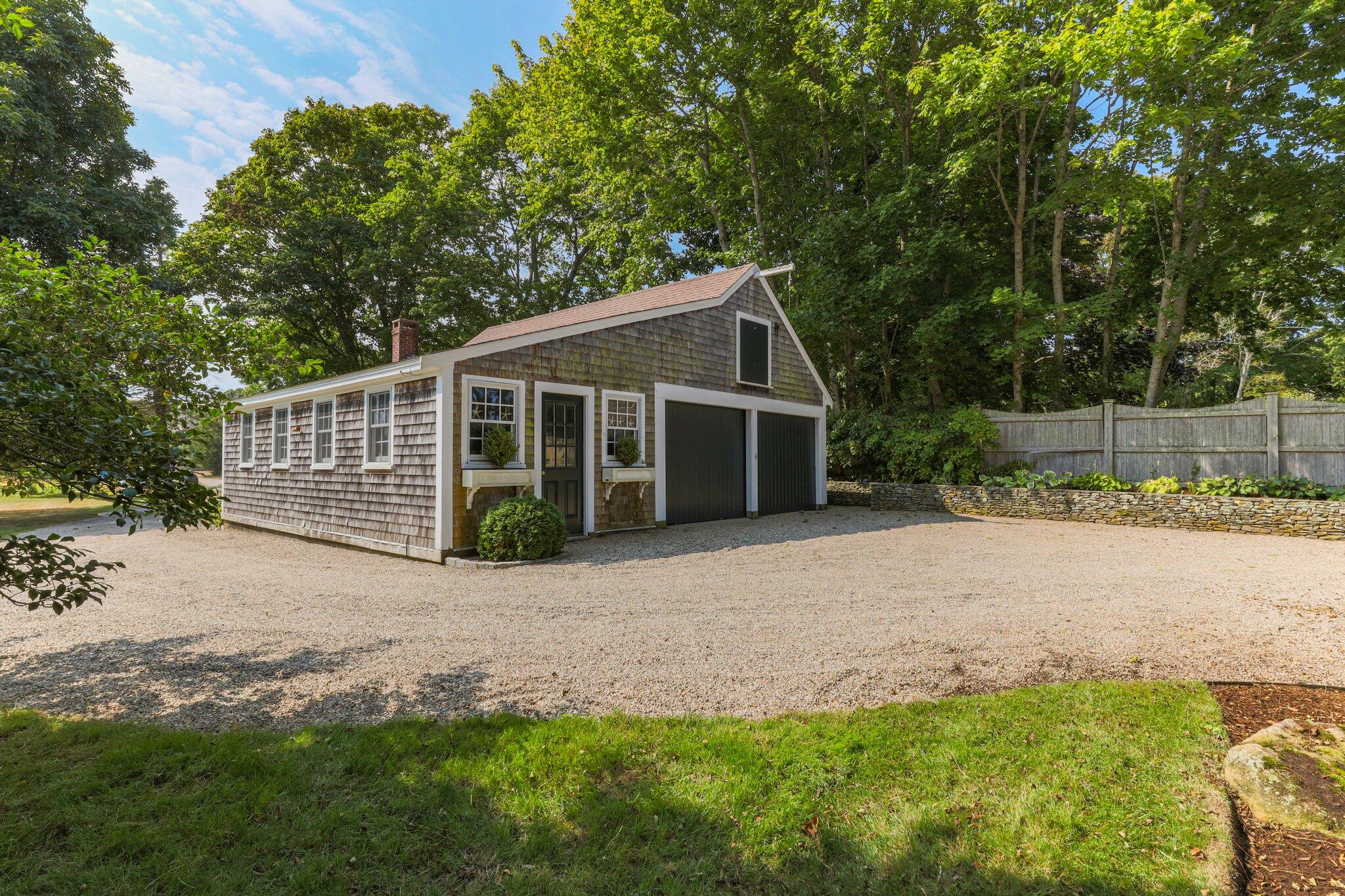 4259 Main Street Barnstable, MA 02630 - Photo 47 of 69 a view of a house with backyard and garden