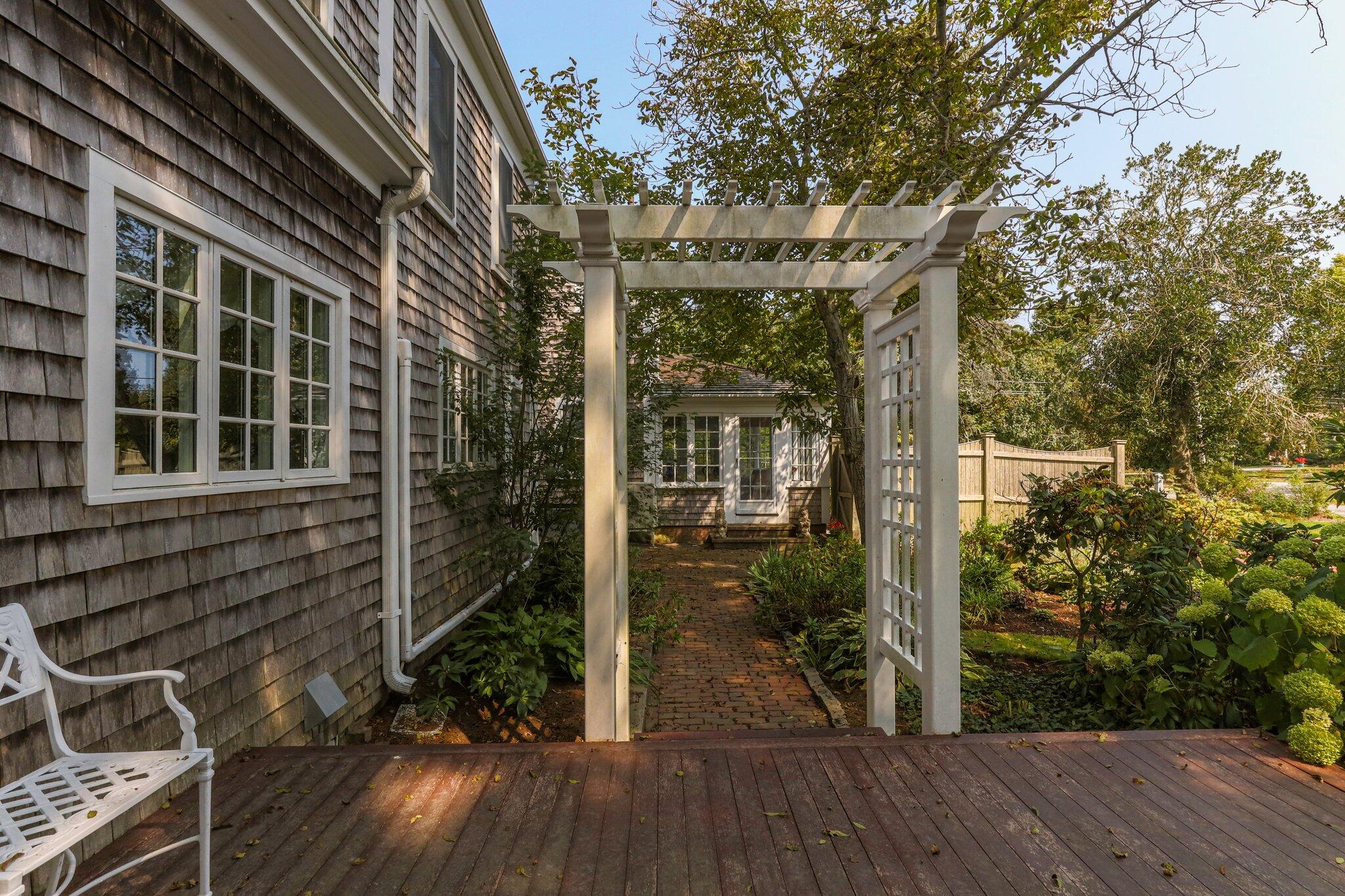 4259 Main Street Barnstable, MA 02630 - Photo 51 of 69 a view of a house with a backyard