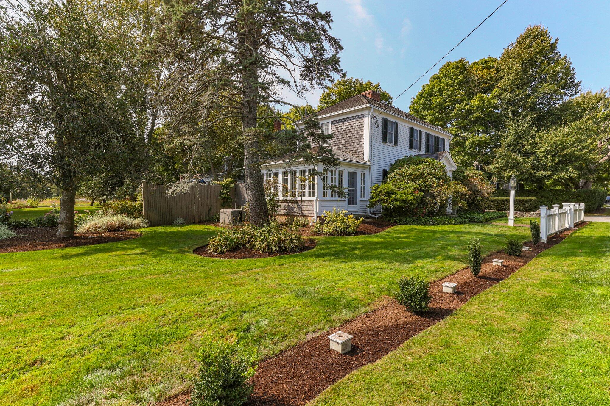 4259 Main Street Barnstable, MA 02630 - Photo 65 of 69 a front view of house with yard and green space
