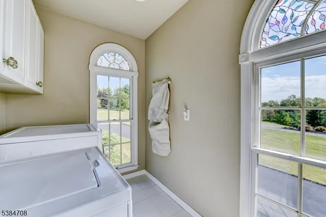a bathroom with a toilet and a bathtub