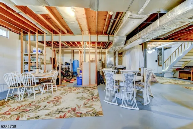 a view of balcony with wooden floor and outdoor seating