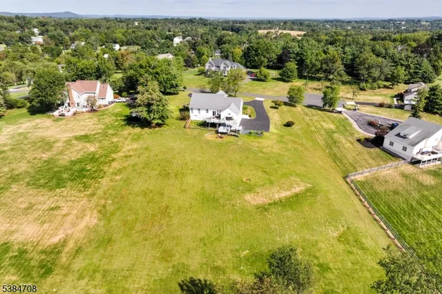 a view of a city with lawn chairs