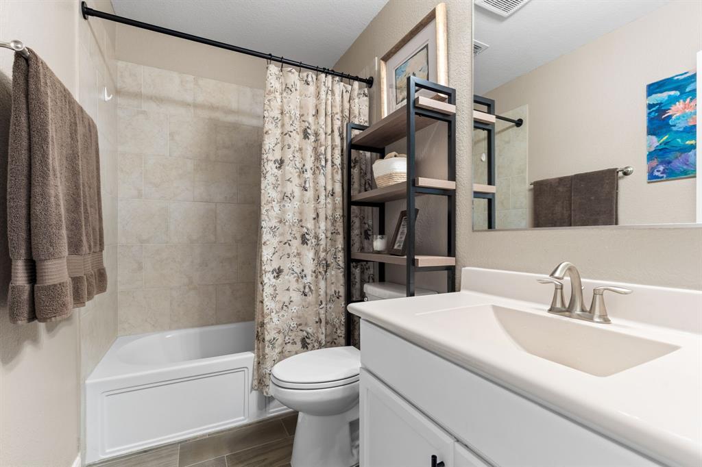 300 Copper Switch Drive Anna, TX 75409 - Photo 18 of 26 Bath sits between 2 bedrooms and offers a tub/shower combo