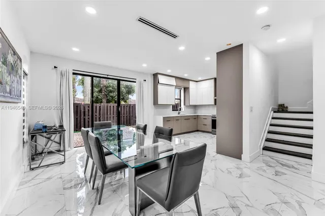 a view of a dining room with furniture