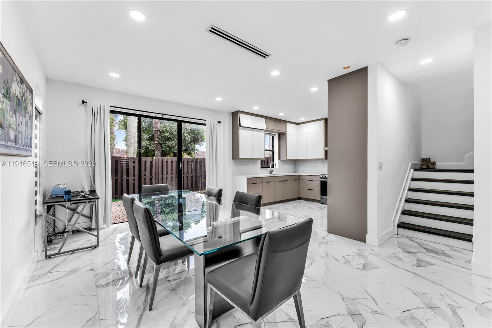 a view of a dining room with furniture