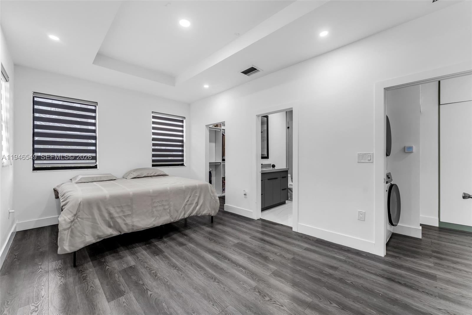 23601 Southwest 112 Court Homestead, FL 33032 - Photo 13 of 61 a bedroom with a bed and a walk in closet