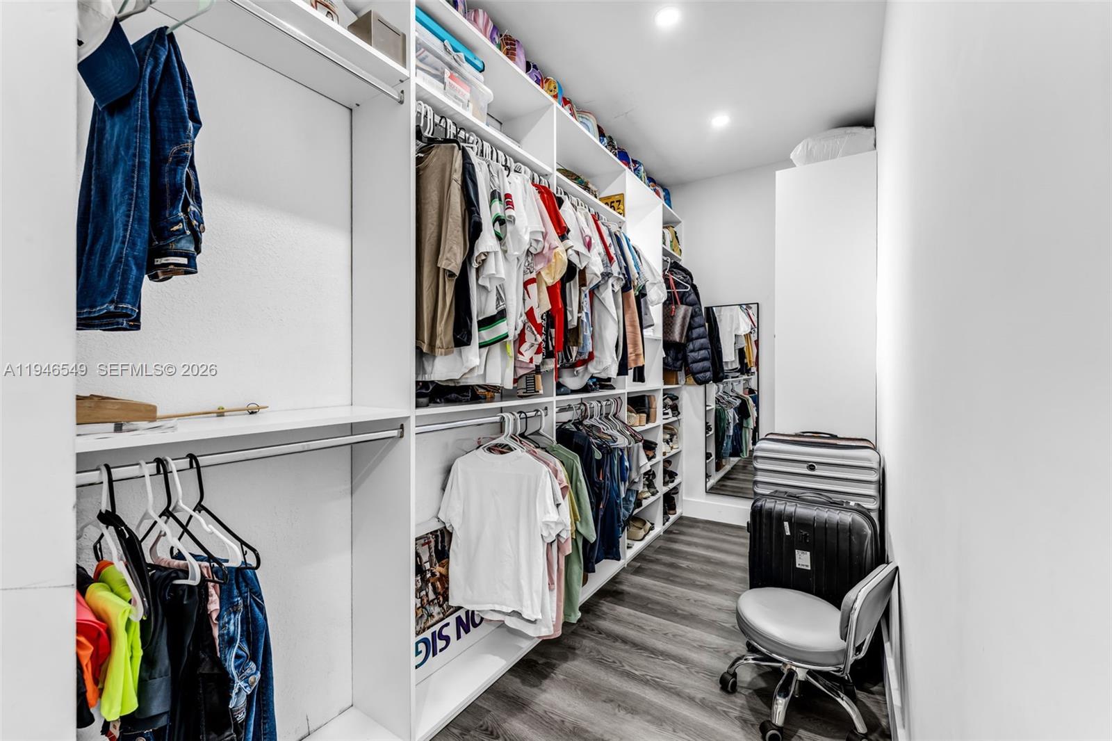 23601 Southwest 112 Court Homestead, FL 33032 - Photo 15 of 61 a view of walk in closet with clothes and shoes