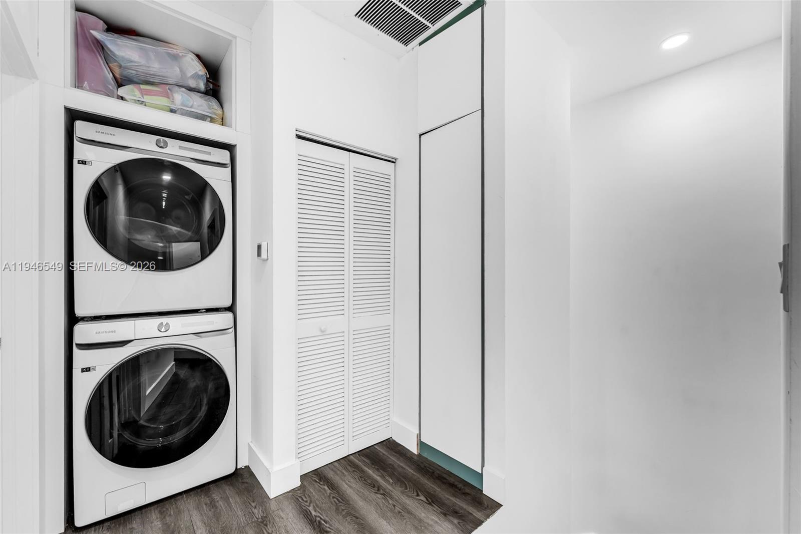 23601 Southwest 112 Court Homestead, FL 33032 - Photo 21 of 61 a view of a hallway with washer and dryer