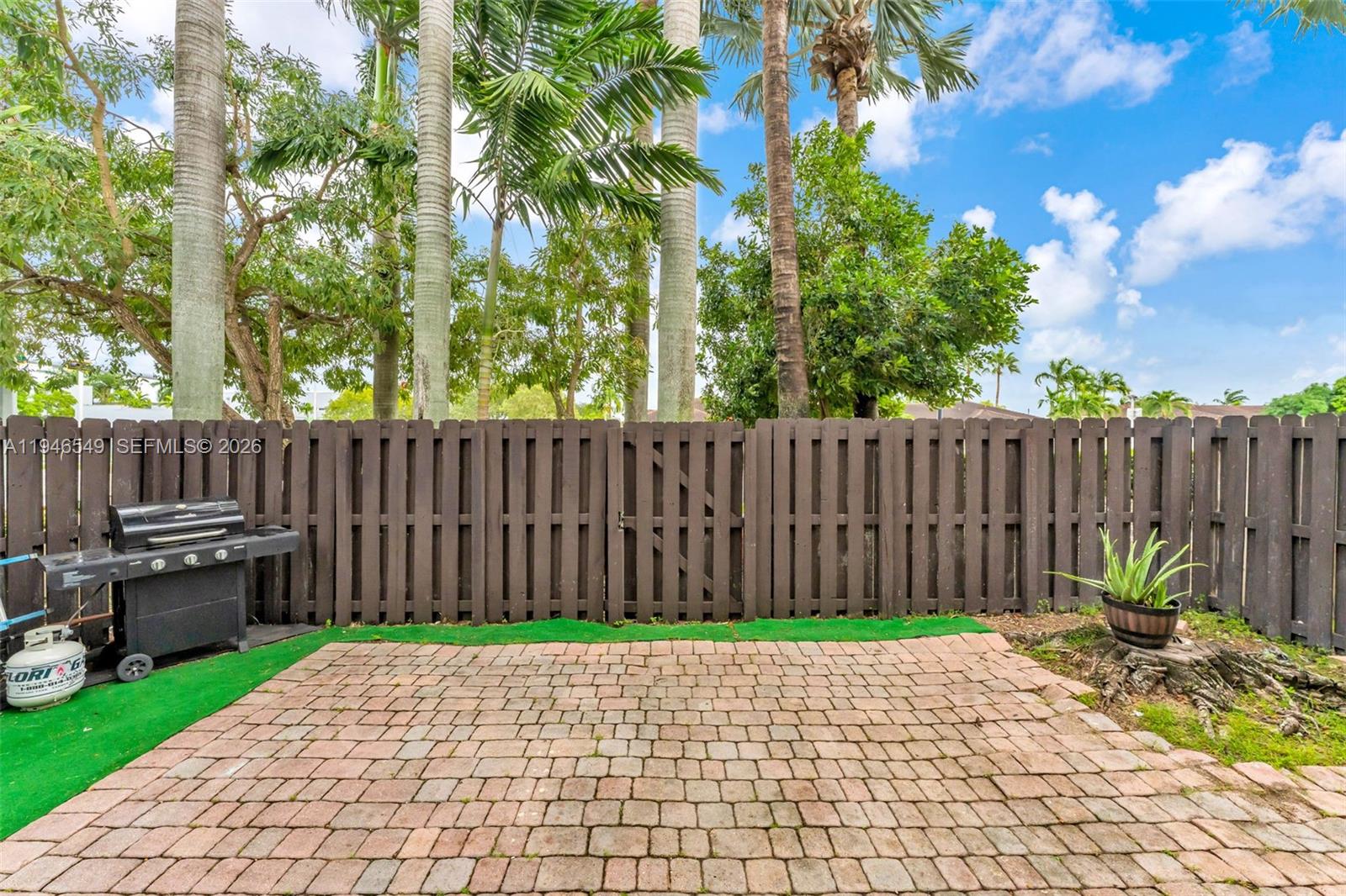 23601 Southwest 112 Court Homestead, FL 33032 - Photo 29 of 61 a view of backyard with wooden fence