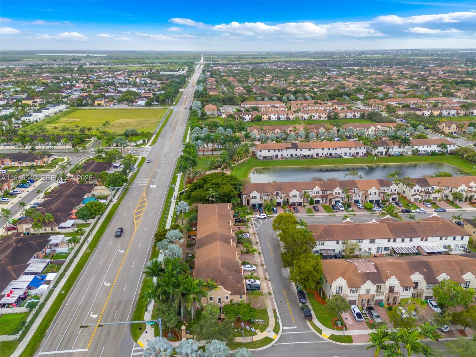 23601 Southwest 112 Court Homestead, FL 33032 - Photo 36 of 61 an aerial view of residential building and lake
