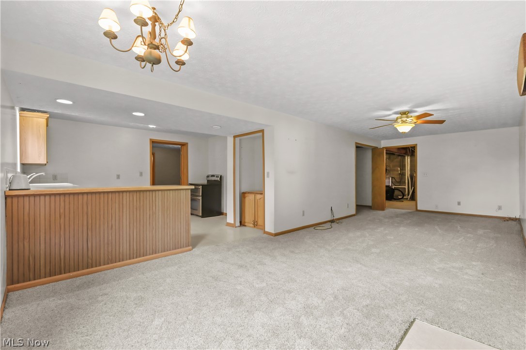 1701 Woods Road Akron, OH 44306 - Photo 33 of 43 Lower level looking towards unfinished part of basement