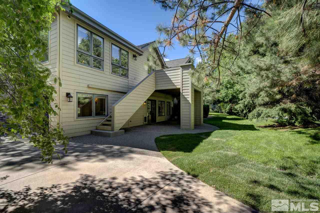 4286 Caughlin Parkway Reno, NV 89519 - Photo 23 of 25 a view of a house with a yard