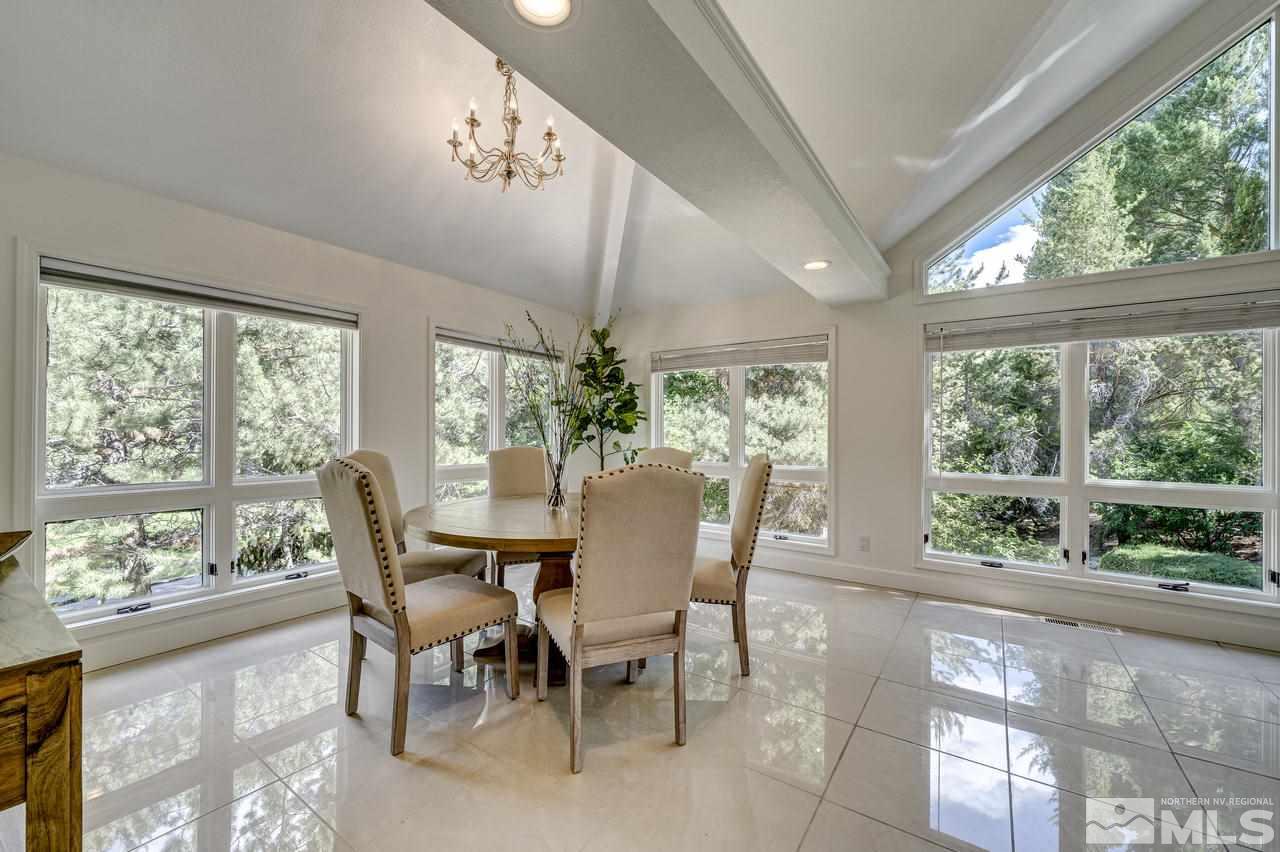 4286 Caughlin Parkway Reno, NV 89519 - Photo 6 of 25 a view of a dining room with furniture window and outside view