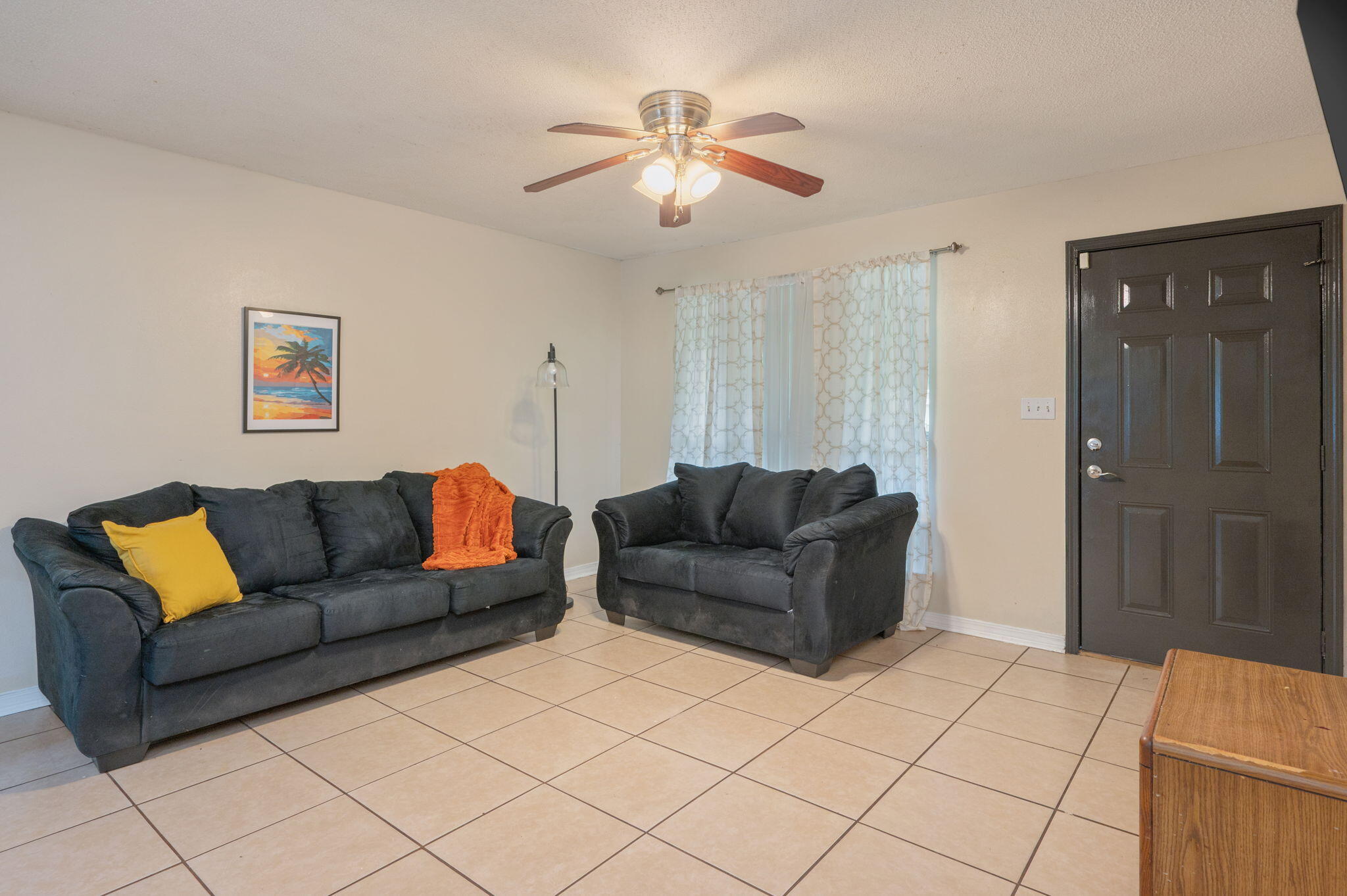 834 McDonald Street Crestview, FL 32536 - Photo 2 of 35 a living room with furniture and a rug