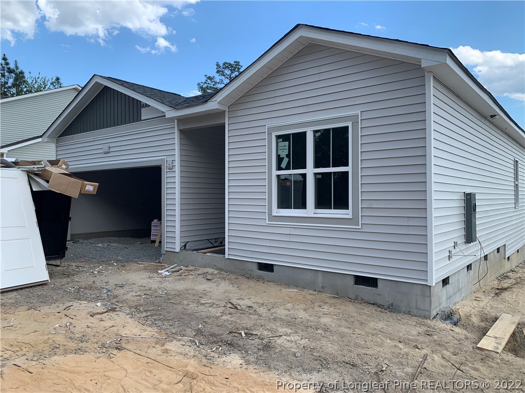 Lot 3 Rockfish Road Aberdeen, NC 28315 - Photo 1 of 2 a view of a house with a yard