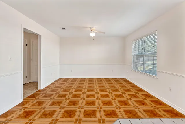 a view of a bathroom from the hallway