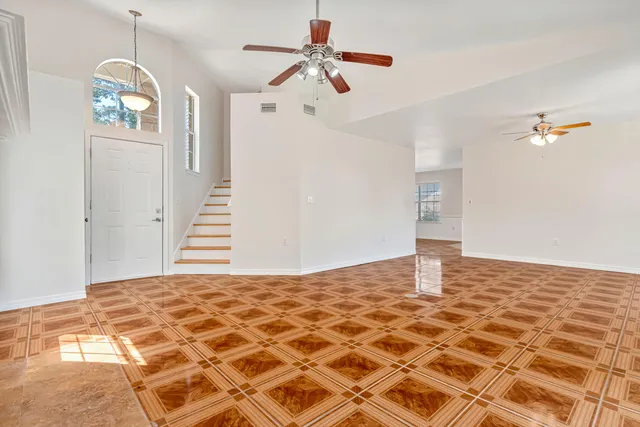 a view of a bedroom with a chandelier