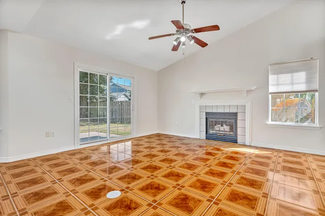 a view of an empty room with windows