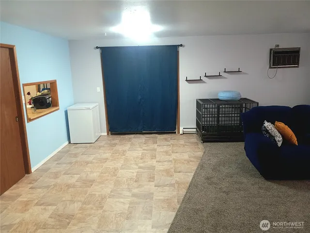 a bedroom with a bed and cabinets