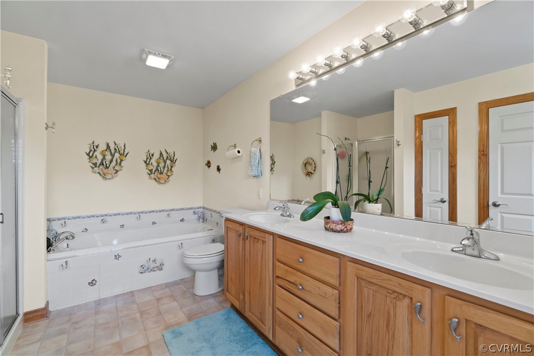 531 Shellfield Road Dunnsville, VA 22454 - Photo 27 of 46 First Floor Master Bath with Double Vanity sinks,