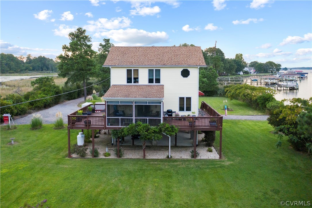 531 Shellfield Road Dunnsville, VA 22454 - Photo 33 of 46 A direct side view of the property beautifully lan