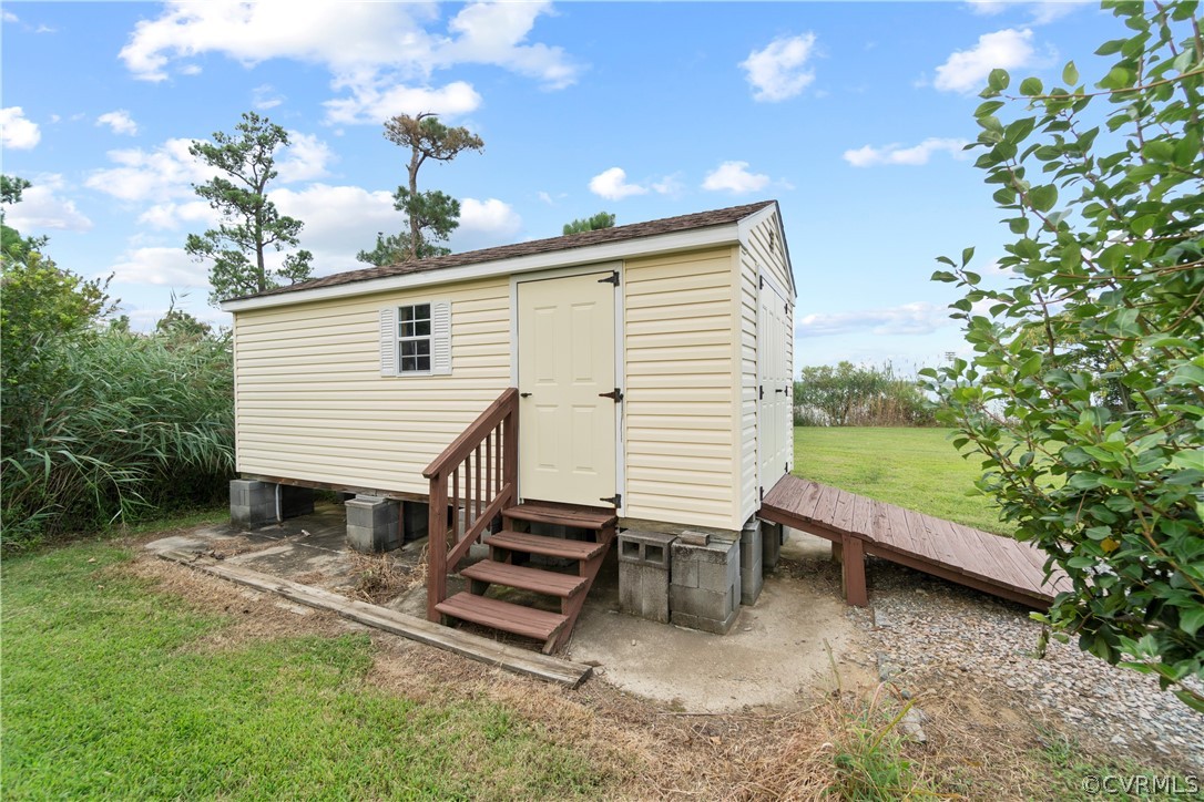 531 Shellfield Road Dunnsville, VA 22454 - Photo 40 of 46 Detached shed to house water toys, etc.