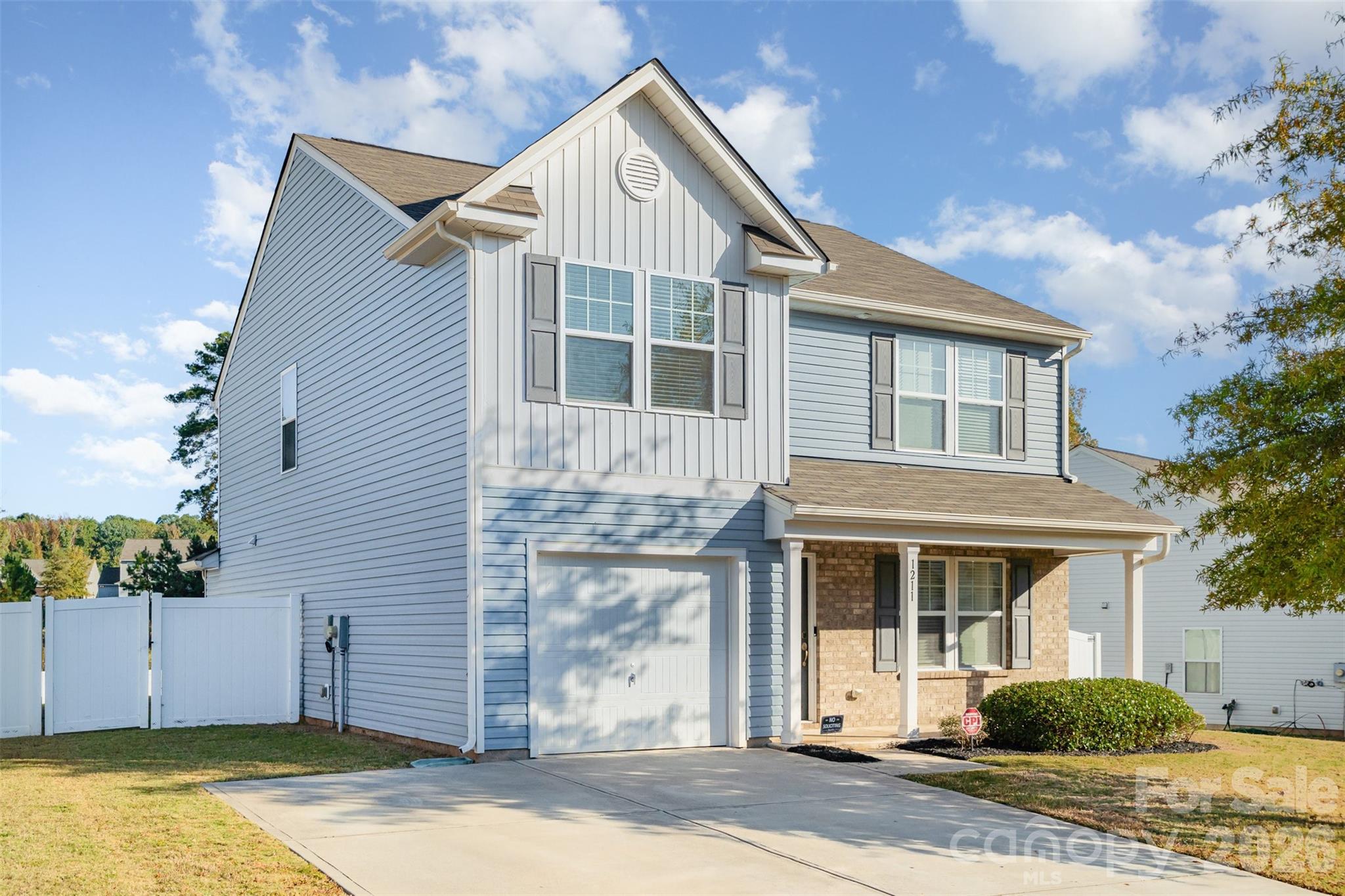 1211 Whitehall Hill Road York, SC 29745 - Photo 1 of 39 a view of a white house with a large windows