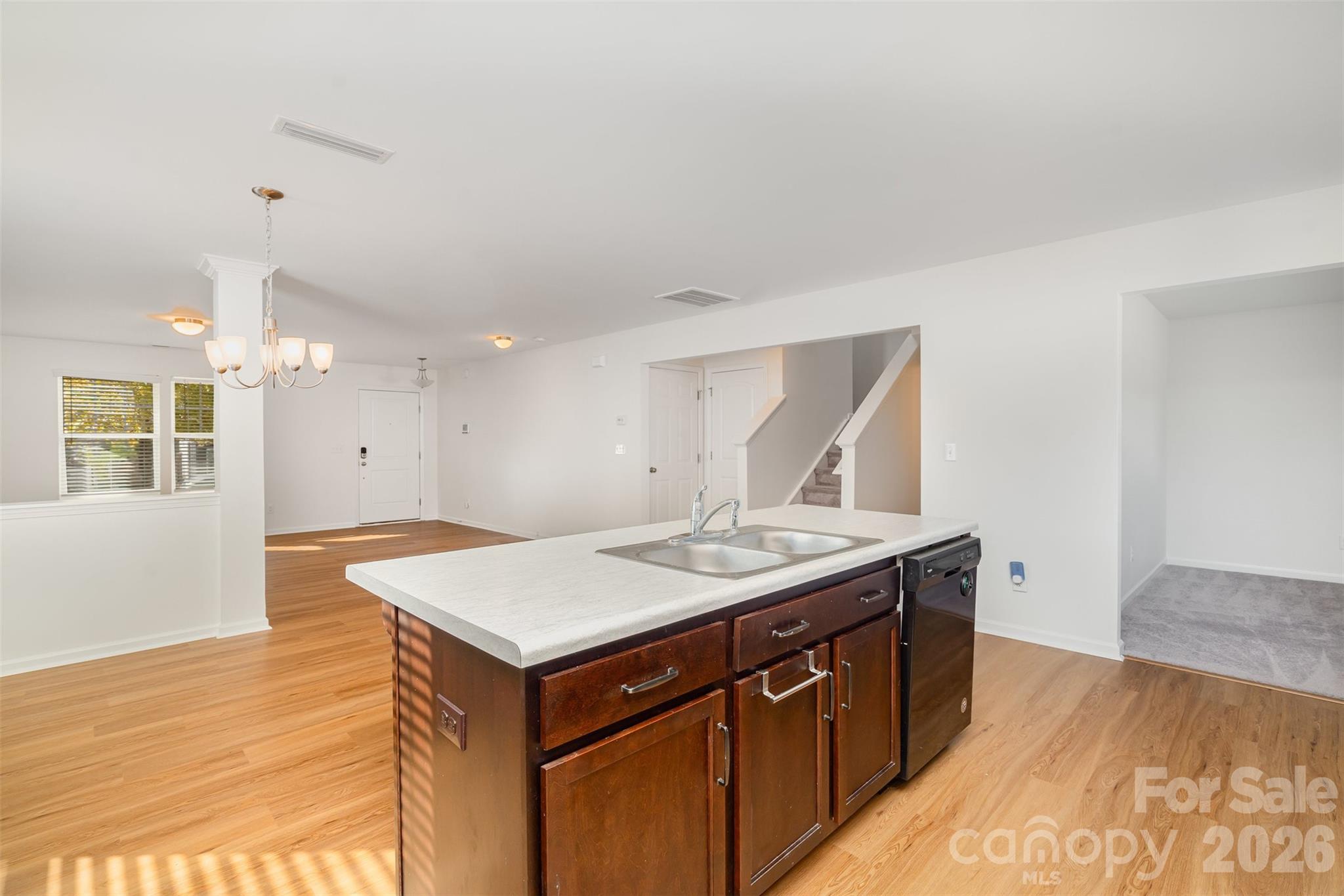 1211 Whitehall Hill Road York, SC 29745 - Photo 13 of 39 a kitchen with a sink cabinets and wooden floor
