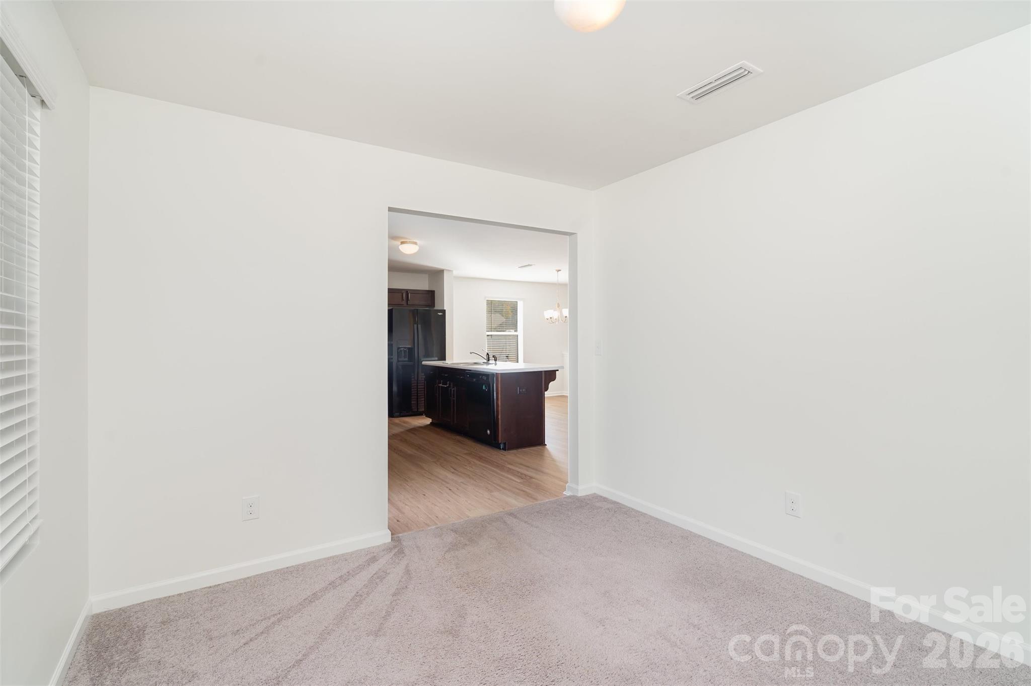 1211 Whitehall Hill Road York, SC 29745 - Photo 16 of 39 a view of a hallway with a kitchen