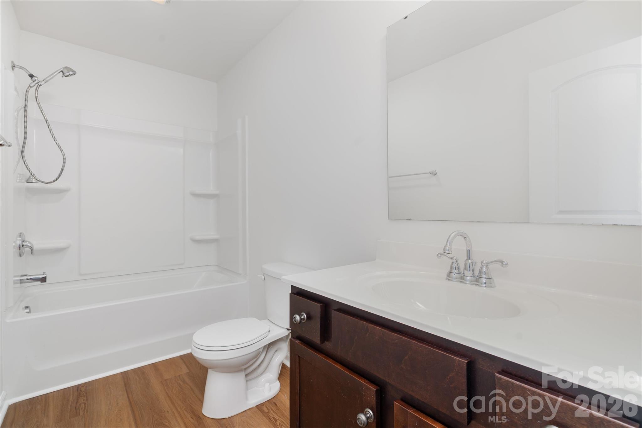 1211 Whitehall Hill Road York, SC 29745 - Photo 32 of 39 a bathroom with a sink a toilet and shower