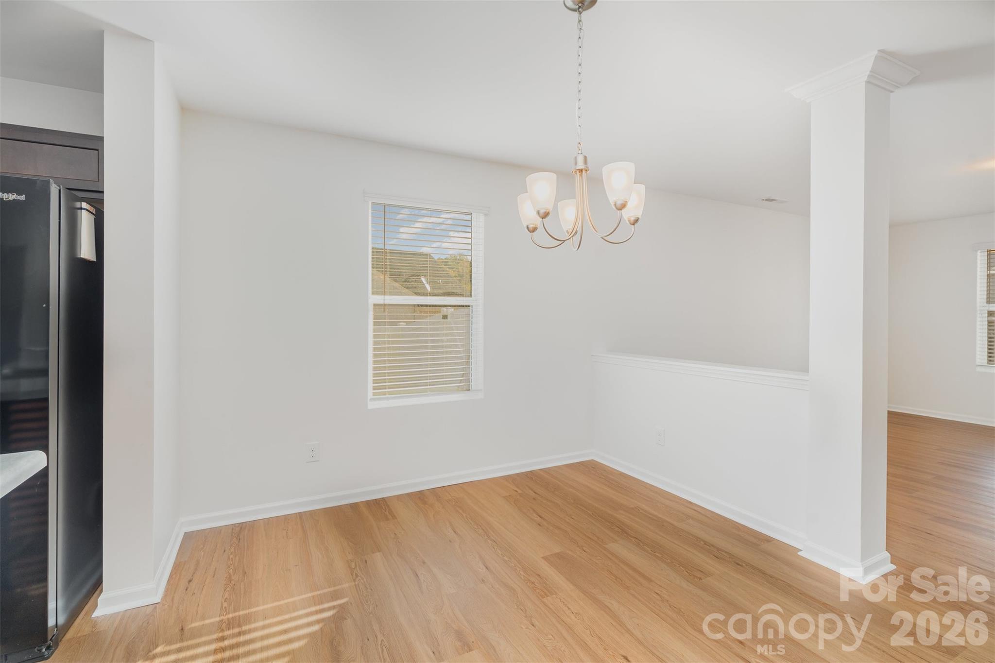 1211 Whitehall Hill Road York, SC 29745 - Photo 10 of 39 a view of empty room with wooden floor