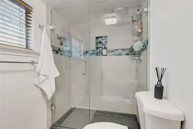 a bathroom with a sink and a shower