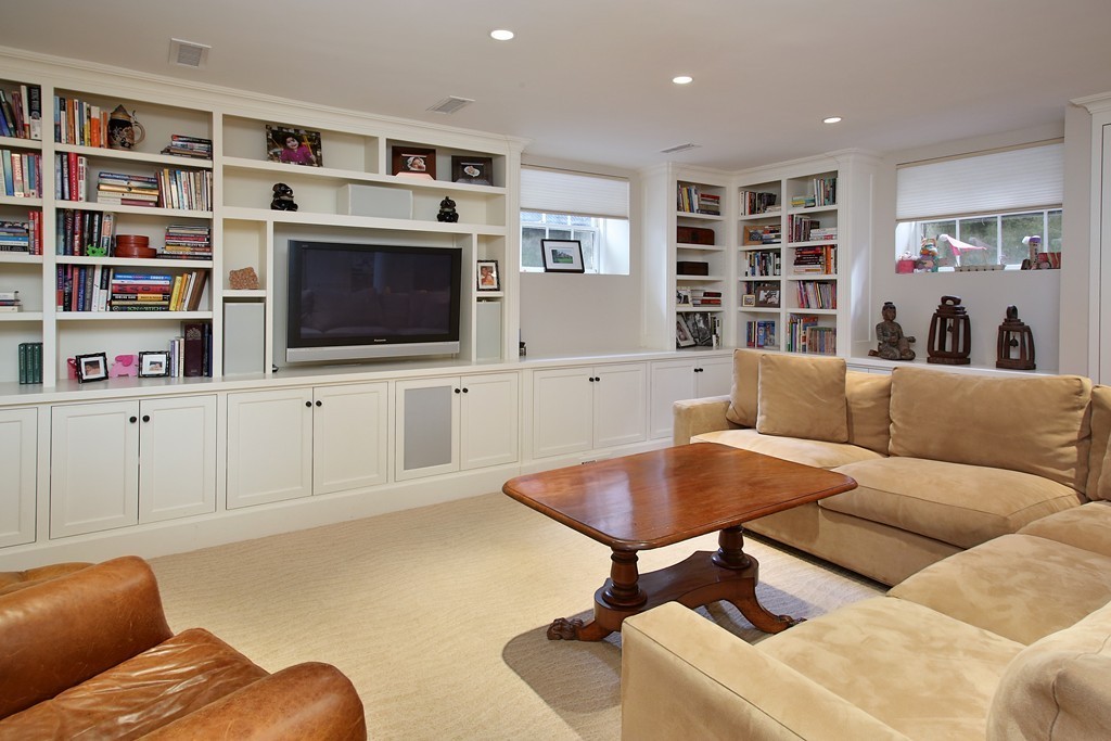 135 Willard Road Brookline, MA 02445 - Photo 11 of 14 a living room with furniture and a flat screen tv