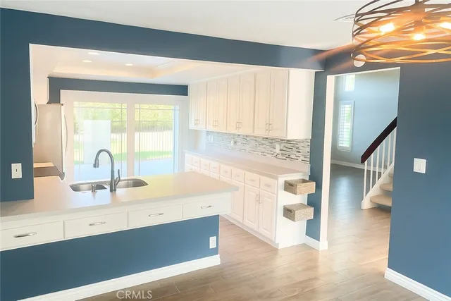 a view of a kitchen with a window