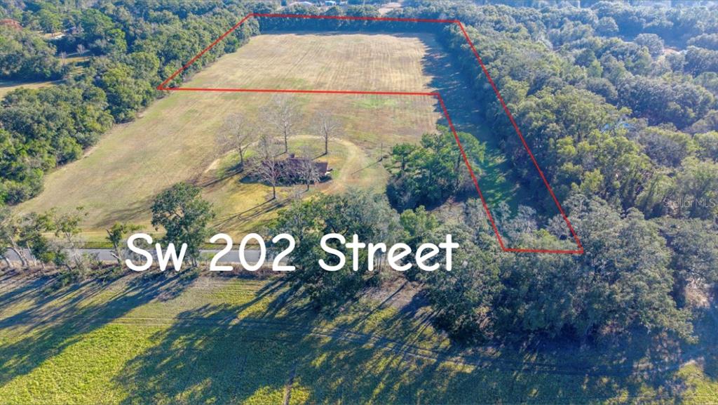 0 Southwest 202nd Street Newberry, FL 32669 - Photo 2 of 12 a sign that is on the side of a road