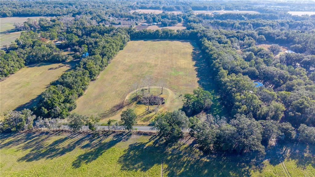 0 Southwest 202nd Street Newberry, FL 32669 - Photo 6 of 12 an aerial view of residential houses with outdoor space