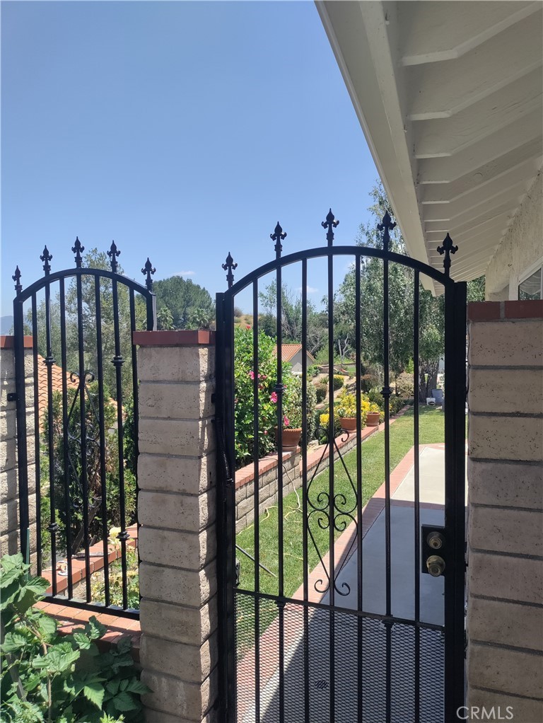 25225 Sagecrest Circle Stevenson Ranch, CA 91381 - Photo 6 of 50 Front side gate.
Wrought iron fence recently painted