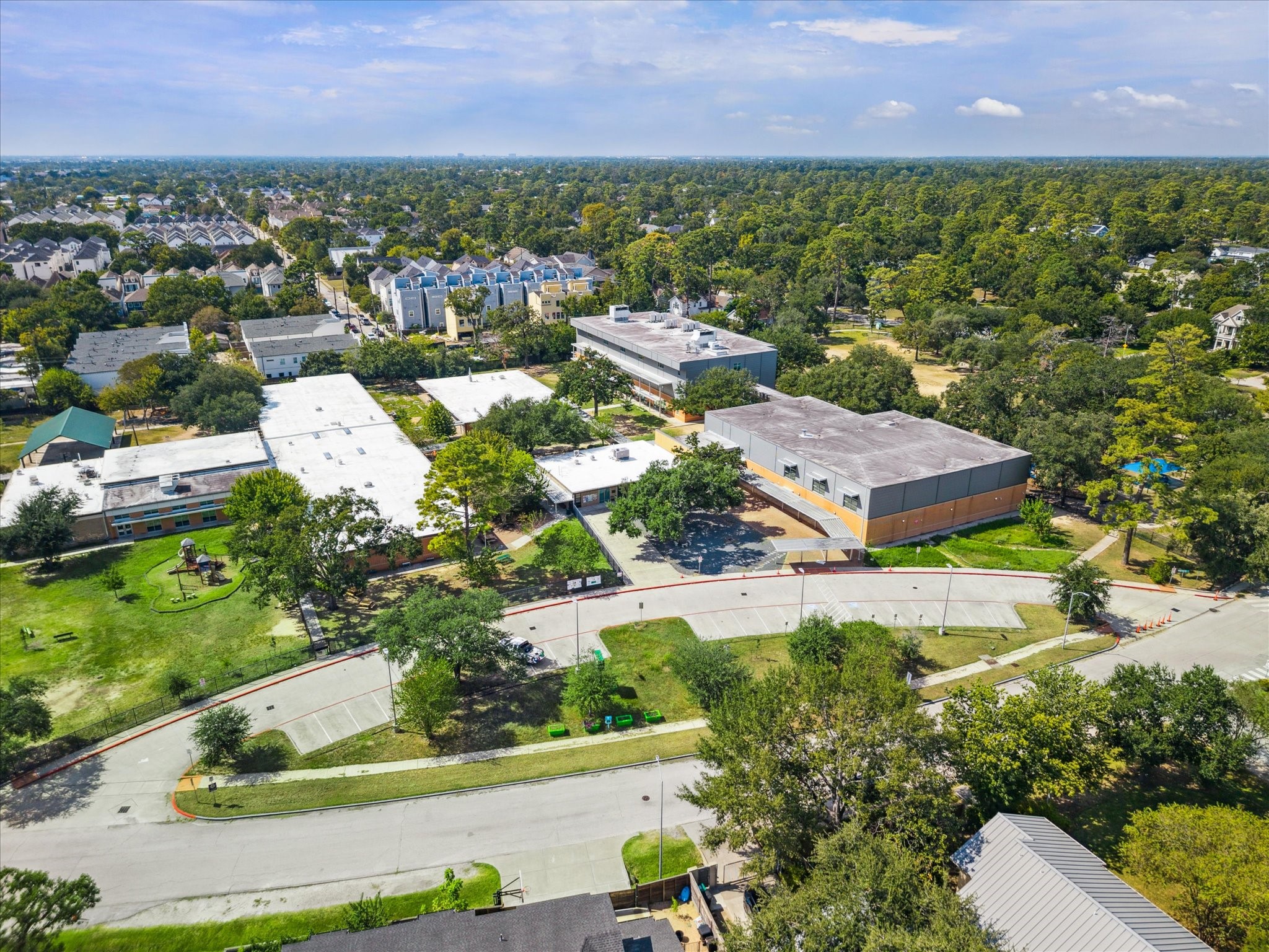 955 West 42nd Street Houston, TX 77018 - Photo 41 of 49 an aerial view of residential houses with outdoor space and trees