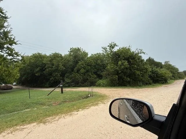 a view of a yard with a sink